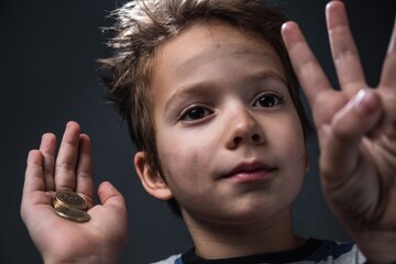 Face close-up Homeless beggar child kid help. beg donation