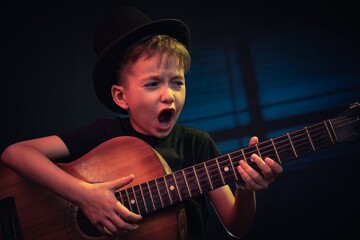 Obraz premium Musician song guitar child music. young people