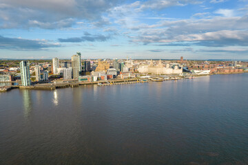 Fototapeta na wymiar Aerial shot of the Liverpool skyline featuring the Three Graces
