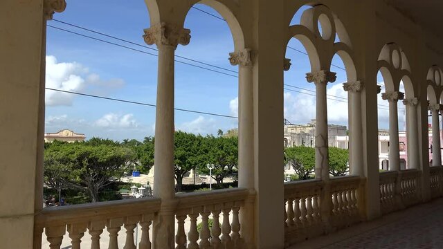 Colonnade of the Museo Municipal Maria Escobar Laredo with the Central Square outside. Caibarien, Villa Clara, Cuba