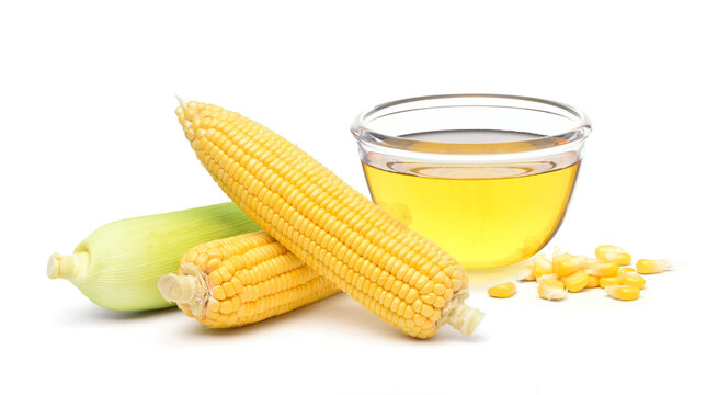 Corn oil with  fresh corn  isolated on white background.