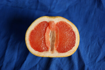 vulva, clitoris and labia symbol. Grapefruit looks like a vulva (vagina), with the clitoris and...