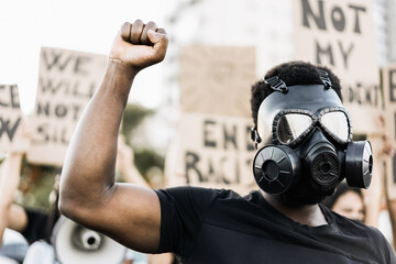 People from different culture and races protest on the street for equal rights - Focus on man face...