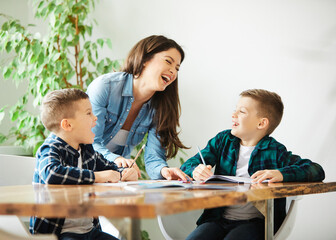 homework teaching education mother children son familiy childhood child teacher classroom
