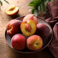 Fresh ripe peaches in a bowl