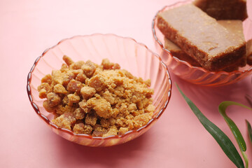 stack of Jaggery traditional cane sugar cube on table 