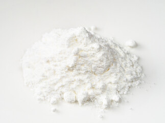Fototapeta na wymiar pile of baking powder closeup on white