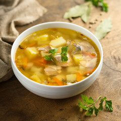 Traditional homemade salmon soup with vegetables