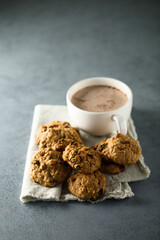 Homemade oatmeal cookies with hot chocolate