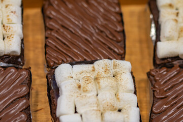 A variety of brownie cakes, very tasty.