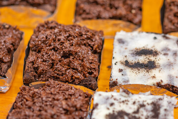 A variety of brownie cakes, very tasty.