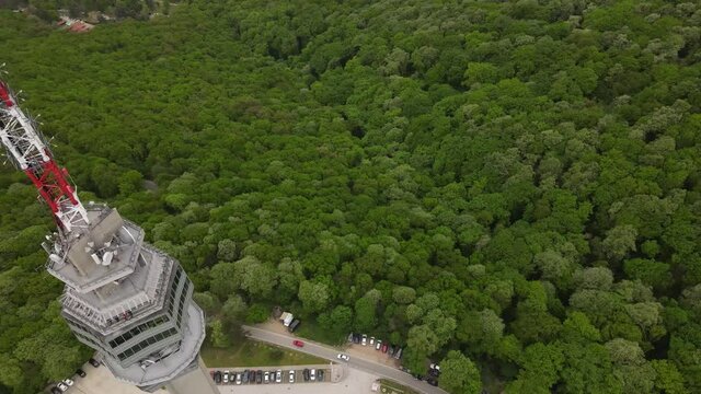 Close up drone shot of Avala tower in Belgrade from bottom to top. Landscape background	