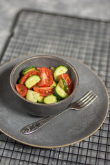 Healthy vegetable salad of tomatoes and cucumbers. Diet menu concept