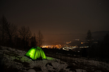 Fototapeta na wymiar Night town in the Carpathian Mountains in winter