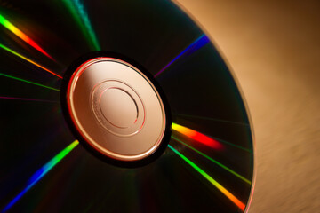 compact disc on a wooden table