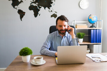 Travel agent making a business call at his office