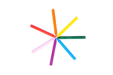 rainbow colored school crayons forming an asterisk. Concept art.