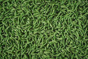 Fresh green casarecce pasta with spinach close-up. Dry pasta texture
