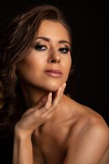 Fototapeta premium Stunning brunette woman with bare shoulders