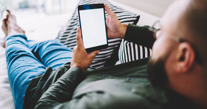 Man surfing modern tablet during rest