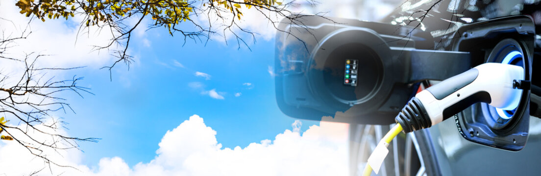 Car environment friendly concept. Charge EV car vehicle electric battery on station with copyspace blue sky on panoramic background. Idea nature electric energy technology green eco. Double exposure.