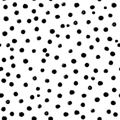 Dalmatian spots vector pattern. Doodle polka dot seamless pattern in black and white. Ink brush strokes.