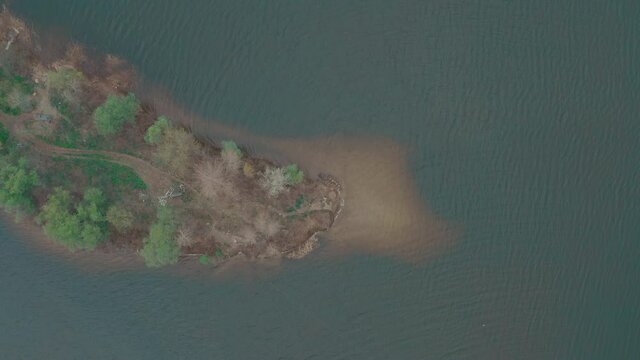 peninsula top view. two peninsulas near each other almost touch each other create a small bay at the mouth of the river. 4k aerial