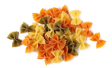 Pasta farfalle tricolore pile made from durum wheat, uncooked isolated on white background