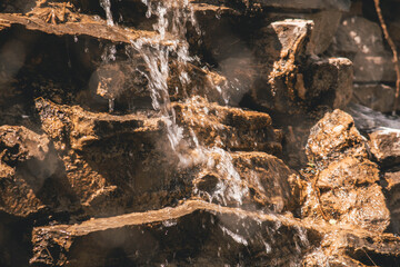 Water runs down the stones 