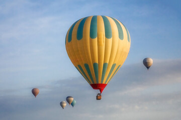 Fototapeta premium Turkey, Cappadocia, hot air balloons over the Cappadocia mountains, a popular destination for tourists. the photos were taken on May 21, 2018 in Cappadocia, Turkey