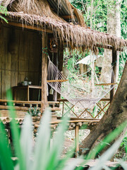 classic Thai hut with crib and forest environment