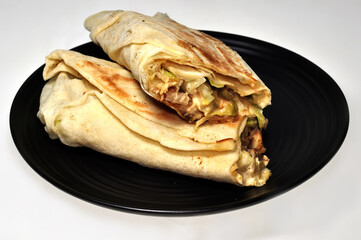 Kebab is a food originating from Turkey which is made from beef rolls wrapped in bread