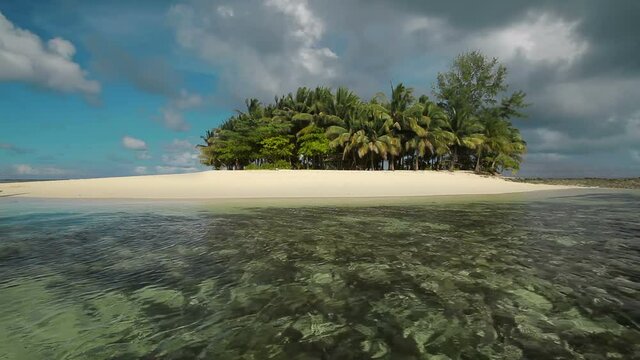 Paradise desert island, ideal form island, clear ocean water and white sand beach . Siargao island, Philippines.