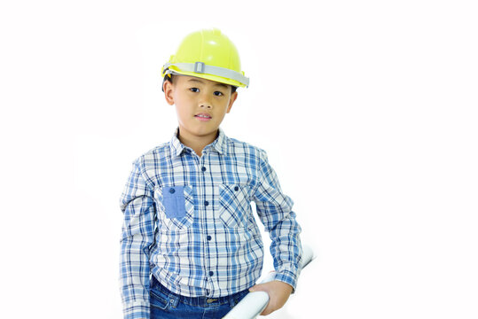 Cute Asian boy 7 years old with engineer uniform, white background