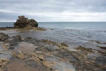 Fototapeta na wymiar Rocky coastline landscape. Tourism in Alicante, Spain