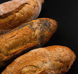 French bread on black background