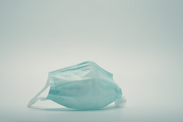 Obraz premium Green colored medical face mask