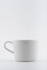 Fototapeta premium White colored Coffee cup on a white background
