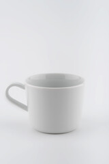 White colored Coffee cup on a white background