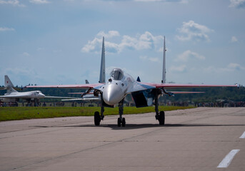 The Russian Knights Russkie Vityazi aerobatic team performs a demonstration flight with aerobatics figures of the international aerospace salon MAKS-2019