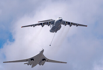 MOSCOW, RUSSIA - MAY 7, 2021: Avia parade in Moscow. tanker Ilyushin Il-78 and strategic bomber and missile platform Tu-160 in the sky on parade of Victory in World War II in Moscow, Russia