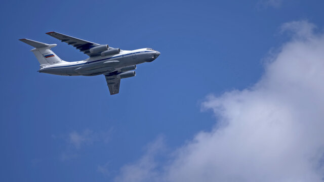 MOSCOW, RUSSIA - MAY 7, 2021: Avia parade in Moscow. 3 Ilyushin Il-76 multi-purpose four-engined strategic airlifters fly in the sky on parade of Victory in World War II in Moscow, Russia