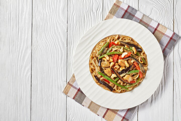 chicken satay rice noodle with veggies, top view