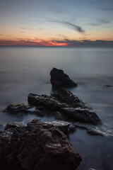 Obraz premium sunset over the sea and beach