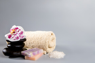 spa still life with towel, stones and sea salt