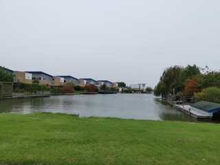 Very beautiful landscape at the lake with a calming view to relax with summery green botany