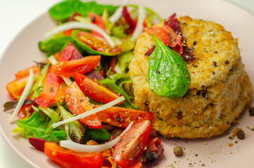 Smoked haddock fishcake with melting cheddar sauce and mixed salad