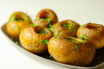Mini jacket potatoes with a fragrant garlic butter infused with Italian truffle oil