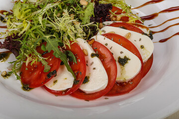 Traditional Italian Caprese salad with mozarela