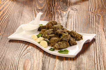 Staffed dolma in grape leaves